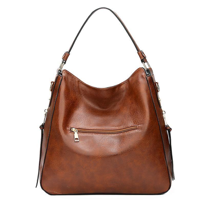 Borsa a tracolla in pelle di lusso con sistema antifurto + portamonete in omaggio