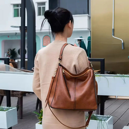 Borsa a tracolla in pelle di lusso con sistema antifurto + portamonete in omaggio