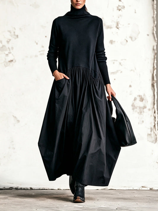 Abito lungo oversize nero con collo alto e tasche decorative