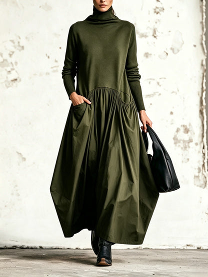 Abito lungo oversize nero con collo alto e tasche decorative
