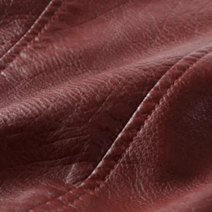 Aria | Giacca da donna corta in ecopelle stile moto con cintura, modello biker