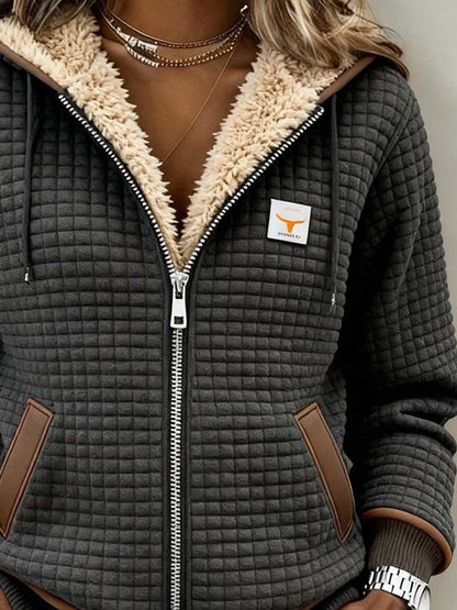 Penelope | Giacca da donna trapuntata con fodera in sherpa, in pile con cappuccio e zip integrale